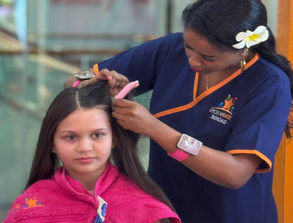 Child with braided hair to prevent head lice naturally