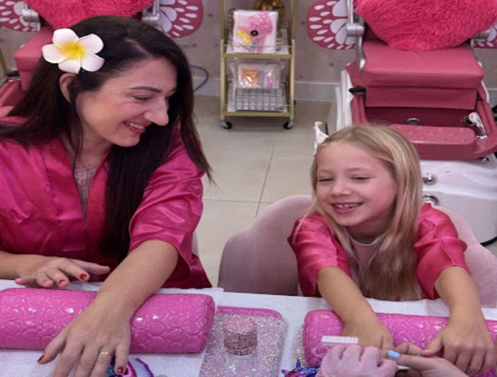 Mother and daughter enjoying a relaxing spa session at StarKids Salon in Dubai